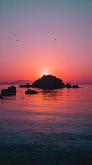 Pink And Orange Sunrise Over Distant Rocky Island Silhouette. High quality
