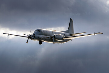 Heavy military transport aircraft in flight. Jet transport army weapons.	