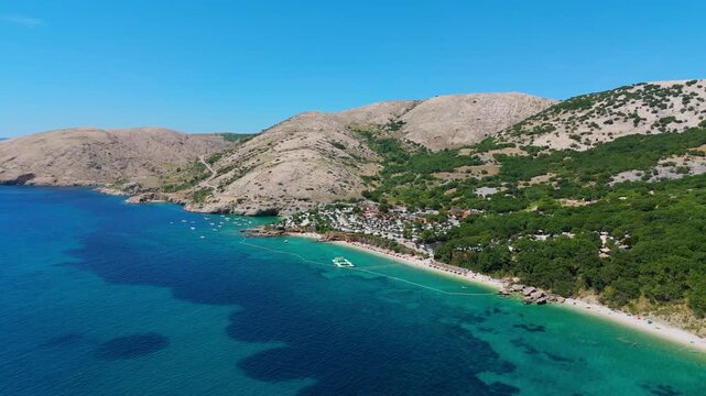Campsite at Campig Skrila, Krk Island, Stara Baska Croatia, Aerial View of the Mountains and Coast With Boats, Beaches and Adriatic Sea. The Seaside Rv Campmobiles on a Summer Beautiful Coastline