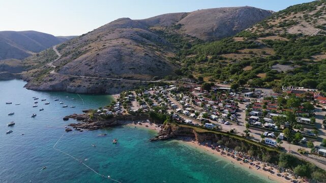 Campsite at Campig Skrila, Krk Island, Stara Baska Croatia, Aerial View of the Mountains and Coast With Boats, Beaches and Adriatic Sea. The Seaside Rv Campmobiles on a Summer Beautiful Coastline
