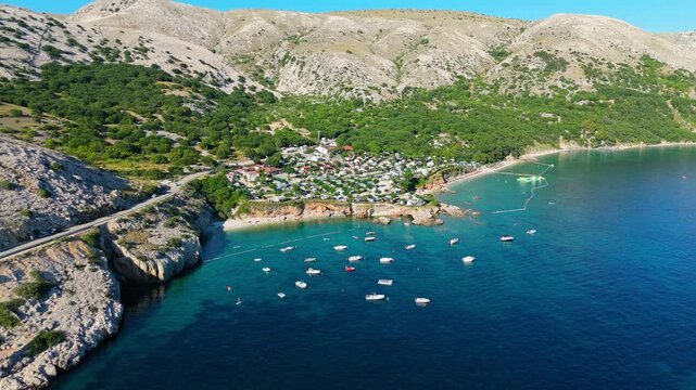 Campsite at Campig Skrila, Krk Island, Stara Baska Croatia, Aerial View of the Mountains and Coast With Boats, Beaches and Adriatic Sea. The Seaside Rv Campmobiles on a Summer Beautiful Coastline