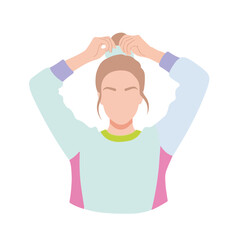 Person puts hair up with a scrunchie, preparing her hairstyle with a comfortable hair tie. This person puts hair up getting ready for a productive day or a workout, demonstrating an everyday style.