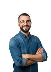 Fototapeta premium Early 30s caucasian man with short dark hair, beard, and round eyeglasses, wearing a blue denim shirt with rolled sleeves, standing confidently, arms crossed, smiling broadly against a clean white