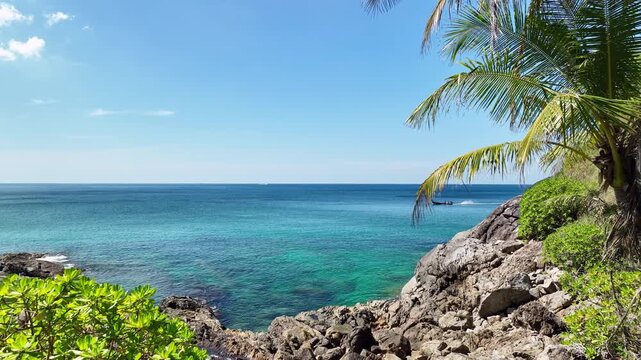 Aerial view Drone camera of seashore rocks in summer season, Beautiful sea surface, Amazing sea waves crashing on rocks seascape in Phuket island Thailand, Aerial view drone 4k High quality footage