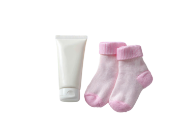 Baby care items, a tube of cream and pink socks