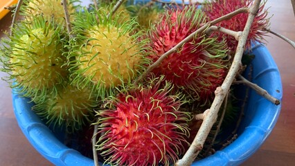 Locals call this fruit 'rambut' and its scientific name is Nephelium lappaceum, this fruit is...