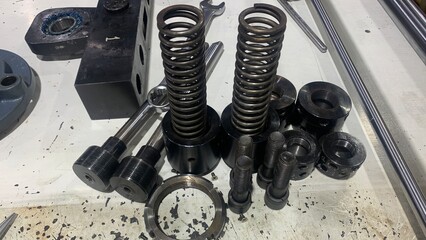 view of machine industry items such as gears and shafts as well as other items for maintenance...