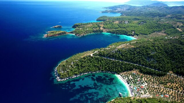 Greece , Sporades. Alonissos island and most beautiful beach - Milia and Chrisi Milia with turquoise sea. aerial drone 4k hd video, greek summer destination