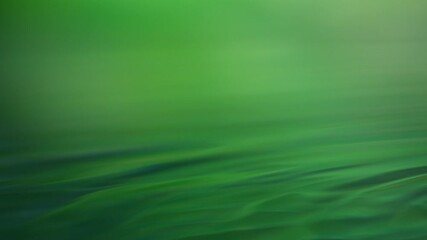 Super slow motion of blackened green water surface. Filmed on high speed cinema camera, 1000 fps. - Powered by Adobe