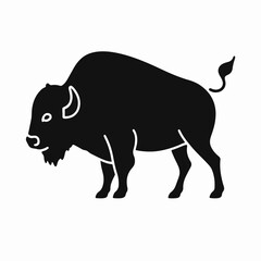 Fototapeta premium Strong bison silhouette standing confidently, showcasing robust form and features. Bison is a symbol of the wilderness and represents strength and resilience.