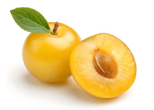 Yellow Plum Fruit Closeup Photo of a Ripe Mirabelle Plum with a Cut Piece. white background