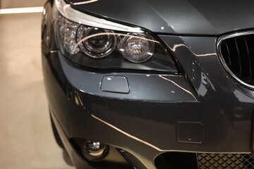 RED Sport coupe car on dark background.