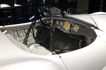 Naklejka premium Luxury convertible car interior with leather seats, steering wheel and manual gear shift
