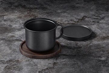 Matte black mug on wooden coaster, dark surface