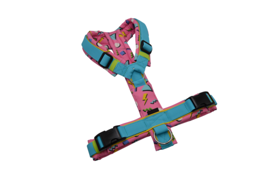 Pink dog harness with blue trim and geometric pattern pet accessory