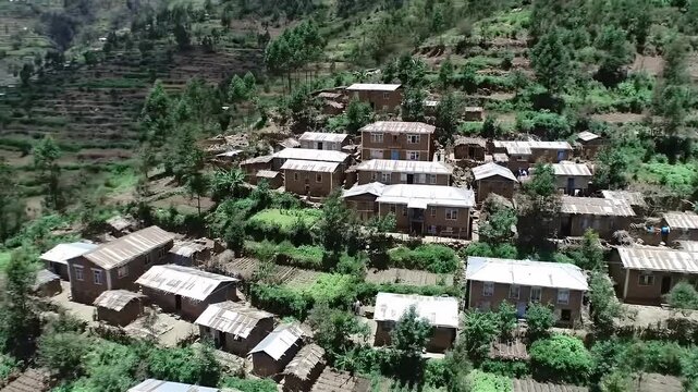 Aerial View of the Traditional Terraced Konso Village in Ethiopia High Angle Drone Shot Showcasing the Unique Architecture and Green Landscape in Daylight a Cultural Heritage Site and a Rural Travel
