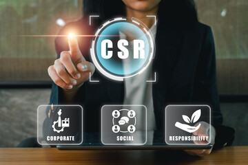 Business professional interacting with CSR icons, highlighting corporate, social, and environmental responsibility.
