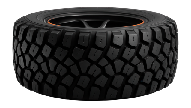 Mud-terrain tire with trapezoidal tread blocks and puncture resistance