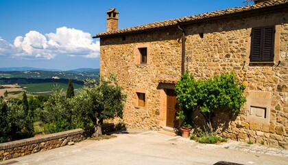 Obraz premium Rustic Italian farmhouse with vineyard view