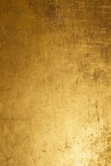 Closeup of a golden texture background with a shiny, metallic surface, perfect for adding a touch of luxury and glamour to any design project