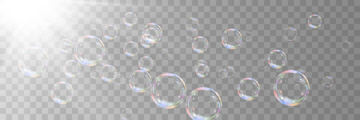 Realistic collection of soap bubbles. Blur effect. Vector. On a transparent background.