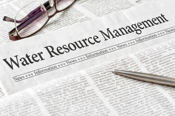 A newspaper with the headline Water Resource Management