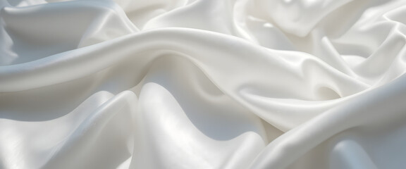 Obraz premium White silk fabric folds with natural lighting and soft shadows, luxurious and clean texture, close-up shot, high detail