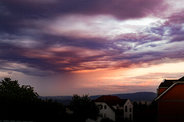 sunset in the mountains with clouds