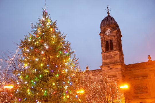 Christmas tree and Guild Hall at dusk, Derby, Derbyshire, England