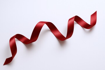 Elegant Red Ribbon on a Clean Background for Gift Wrapping and Decor
