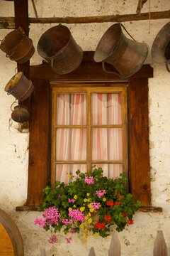 Shuttered windows and flowers, Corvara, Badia Valley, Bolzano Province, Trentino-Alto Adige/South Tyrol, Italian Dolomites, Italy