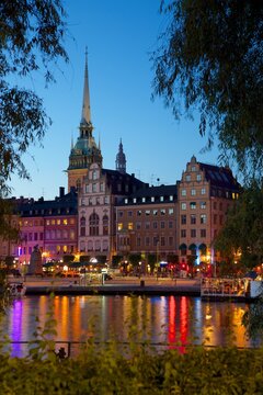 Gamla Stan and Riddarholmen with spire of Riddarholmskyrkan (Riddarholmen Church) at dusk, Stockholm, Sweden, Scandinavia
