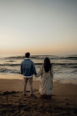 couple on the beach at sunset