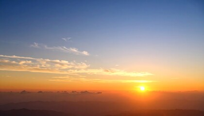 Fototapeta premium Sunrise over misty mountains (7)