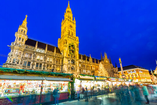View of Christmas Market in Marienplatz and New Town Hall at dusk, Munich, Bavaria, Germany