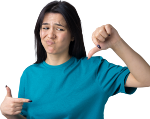 Young brunette in a blue tank top giving thumb down gesture looking with negative expression