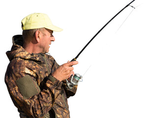 Fishing in the reeds for spinning on quiet water. A man in camouflage clothes in cool weather is...