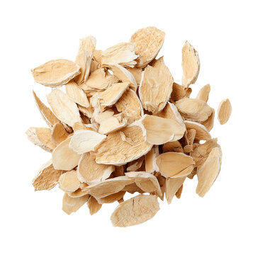 Dried sliced astragalus root isolated on white background