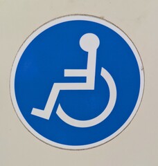S&iacute;mbolo hombre en silla de ruedas. Se&ntilde;al de discapacitado 