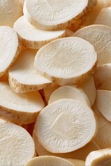Close-Up of Freshly Sliced Root Vegetable on Wooden Surface with Natural Light