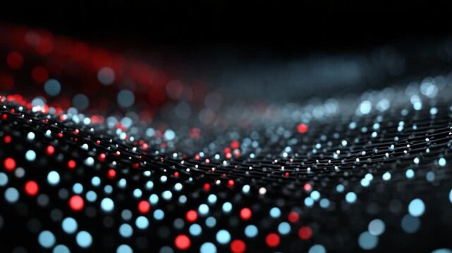 A wave-like pattern formed by tiny dots in varying colors of red and blue, creating a blurred visual. The backdrop is dark