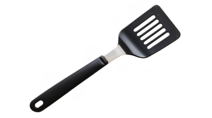 A black spatula with a slotted head rests on a white background, perfect for kitchen tasks like flipping burgers