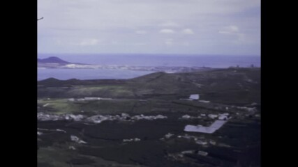Canary islands coastline showing alegranza island in 1969