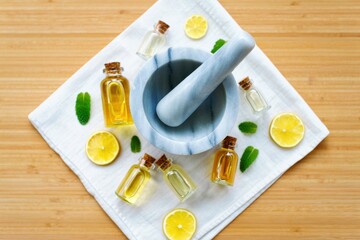 Create your own natural essential oils with fresh lemon and mint in a modern kitchen setting