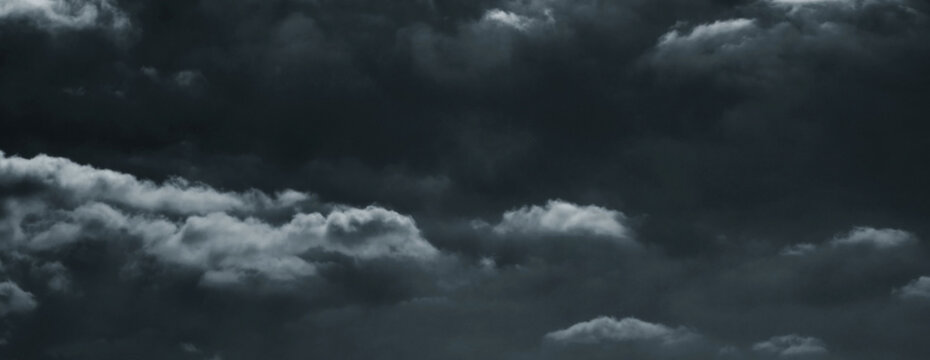 Stormy dark cloudy sky. Pollution, PM 2.5, Carbon dioxide and environment problems concept. Halloween, scary scene thunderstorm and rainy season backdrop.