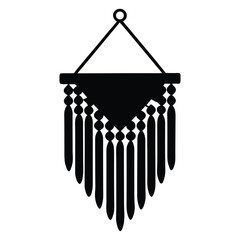 Black macrame wall hanging with tassels on white background