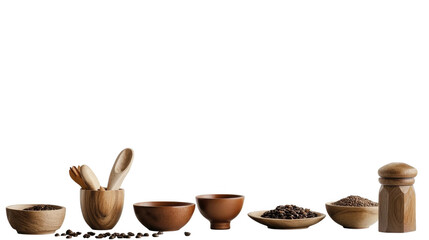 Wooden bowls and utensils with coffee beans are arranged on a white background, highlighting kitchen prep