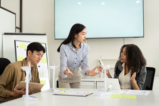 Sustainability Discussion: Team Brainstorming Renewable Energy Solutions