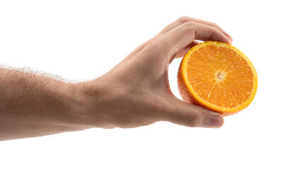 Fresh orange being held in a hand