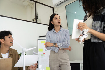 Sustainability Discussion: Team Collaborating on Eco-Friendly Initiatives